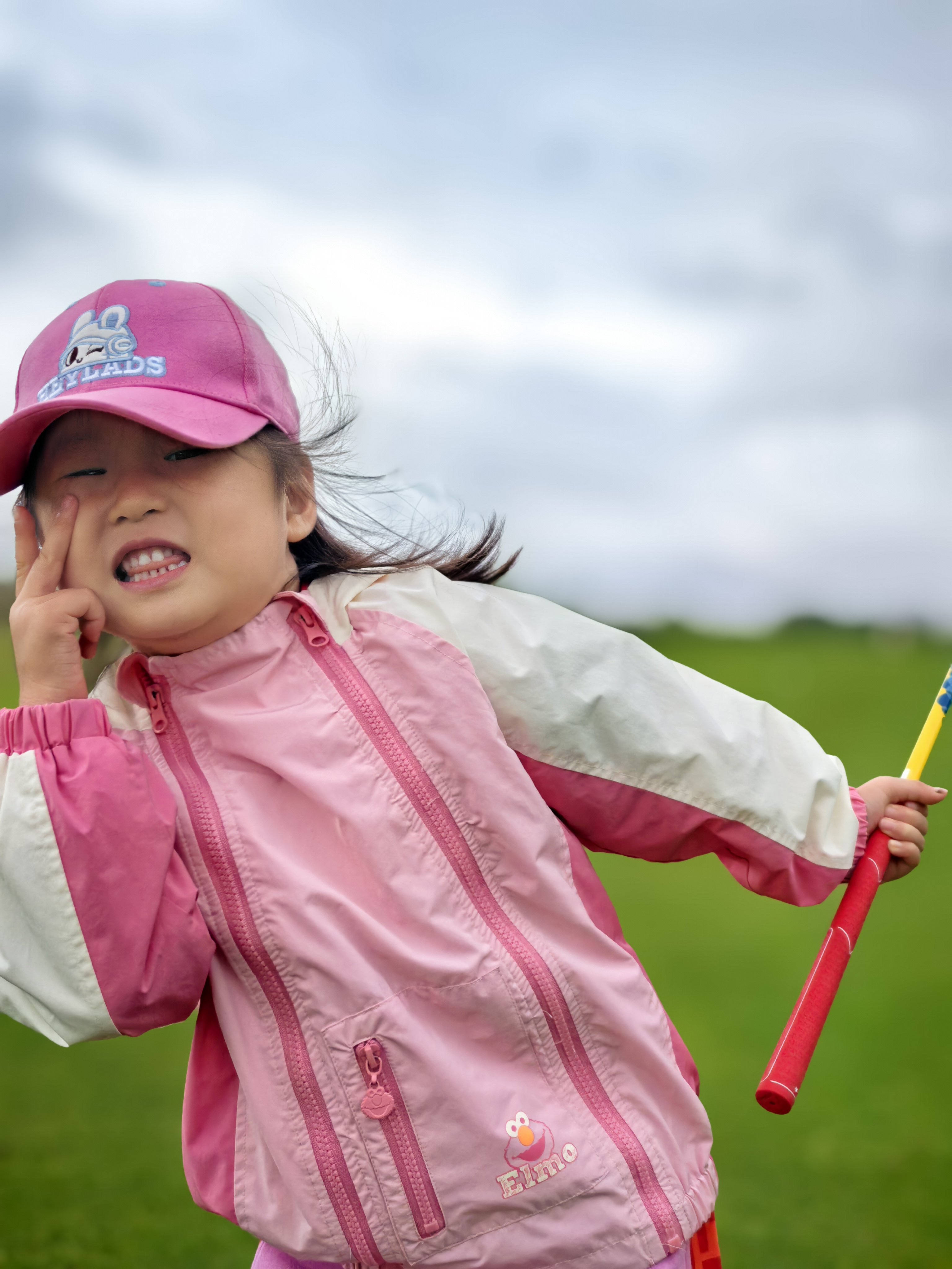Melody practicing her golf swing